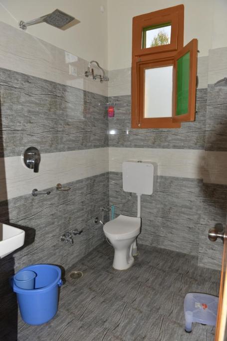 Tulip Flowing River View Hotel. Shamshi المظهر الخارجي الصورة